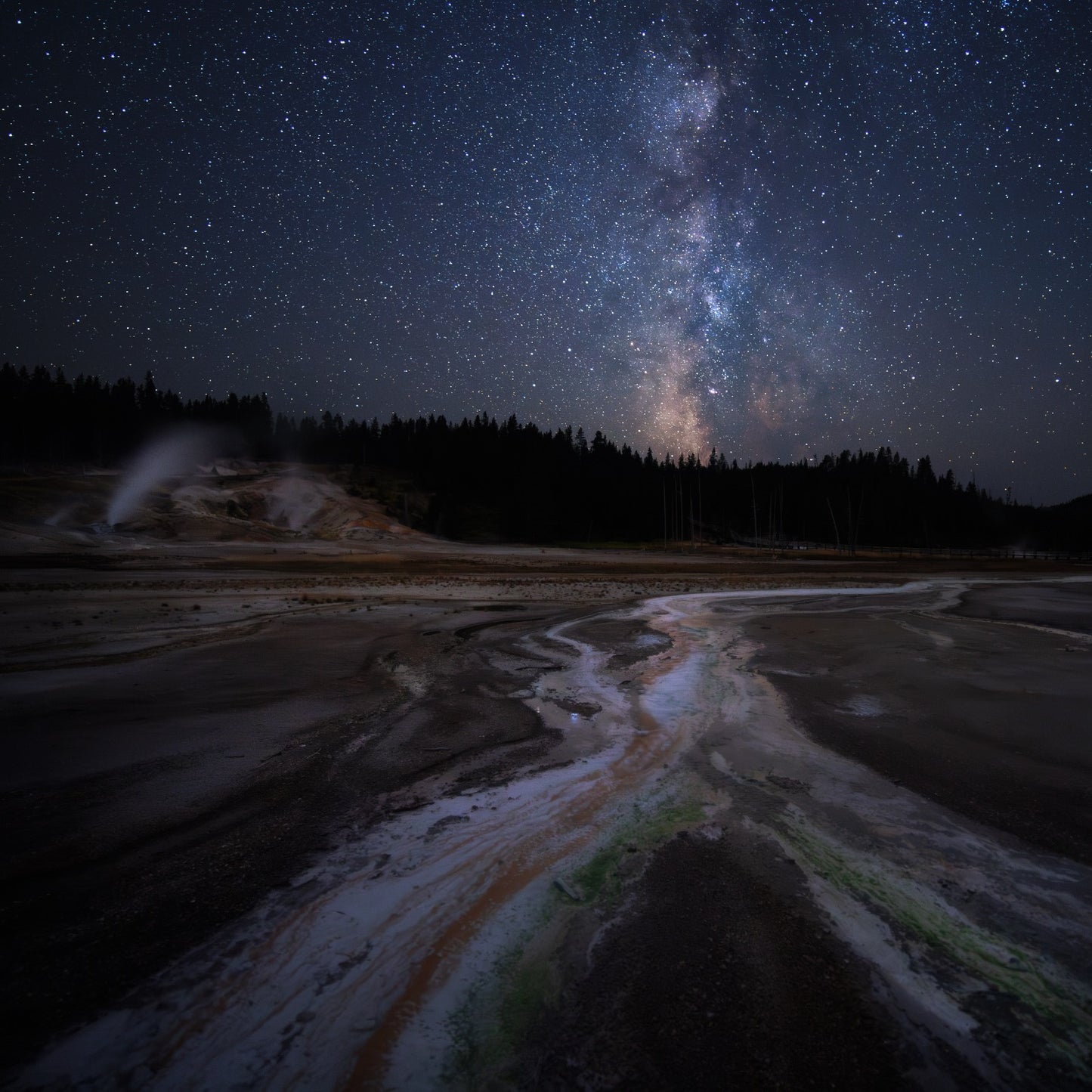 milky way over norris geyser basin in yellowstone national park
